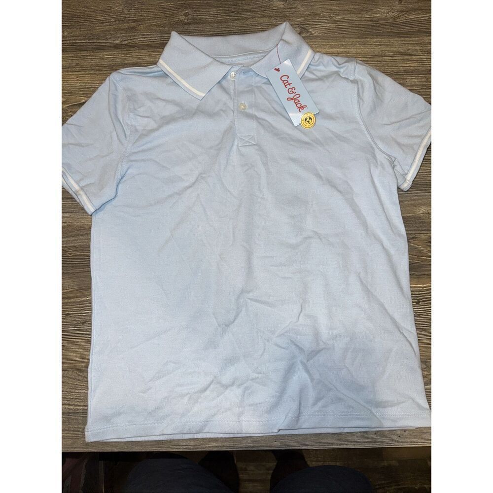 Boys' Short Sleeve Tipping Polo Shirt - Cat & Jack Light Blue Medium. NWT. C